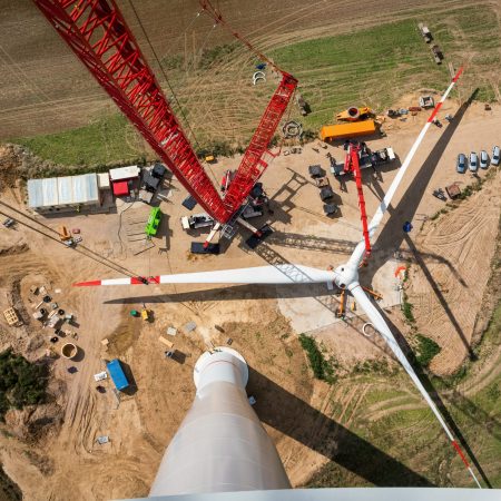 Assembled rotor blades of a wind turbine are seen from high abov